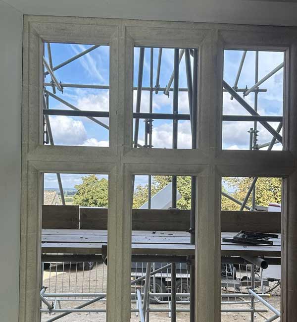 Bath stone window casements cleaned at country house near Swindon, Wiltshire