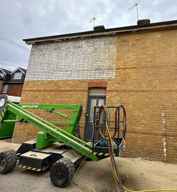 Paint removal from red brick semi-detached in Egham, Surrey
