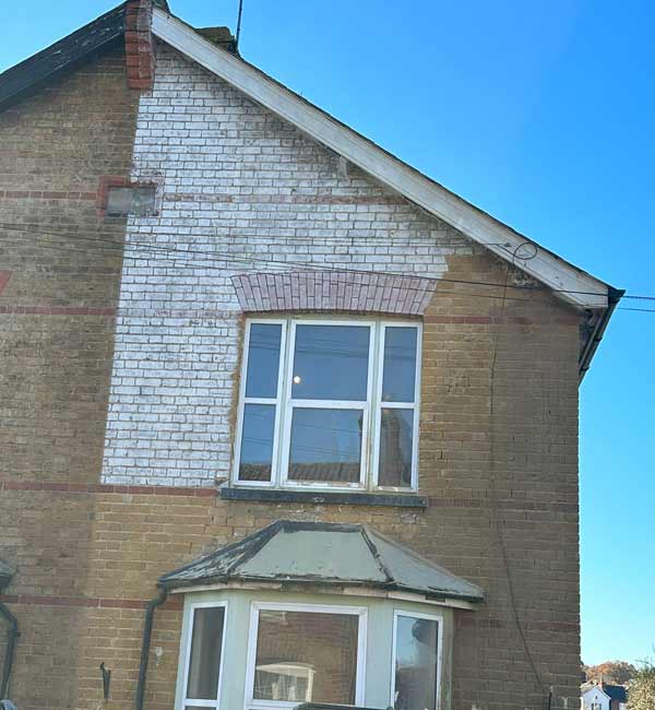Paint removal from red brick semi-detached in Egham, Surrey