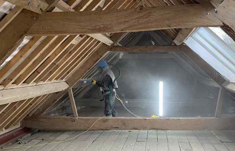 Sensitive cleaning of old roof timbers for roof renovation near Henley, Oxfordshire